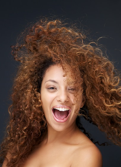 Patient with restored textured curls